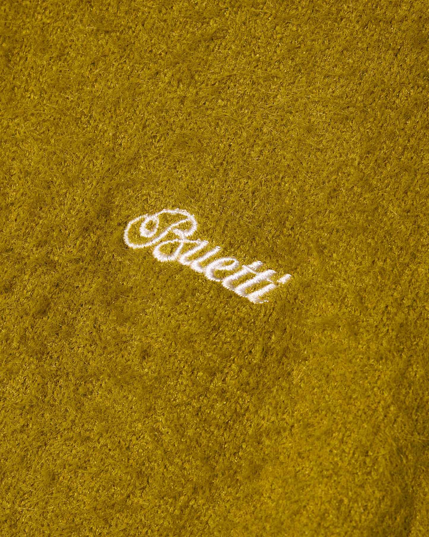 Fuzzy Grinch Green Polo